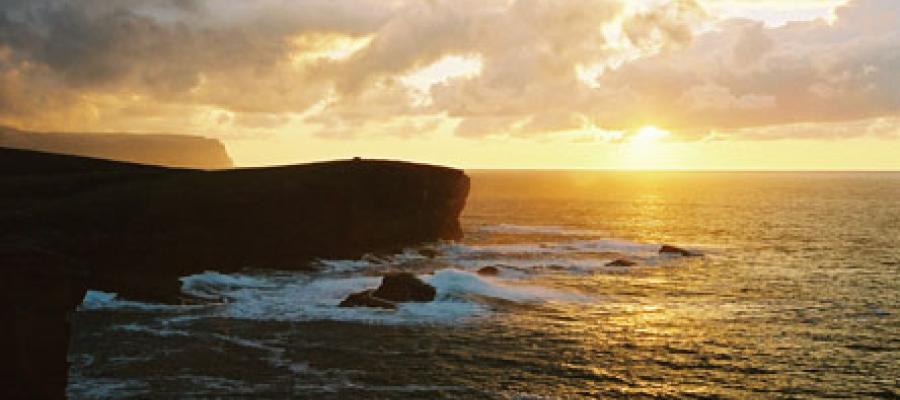 Sunset over cliff, Yesnaby, Orkney