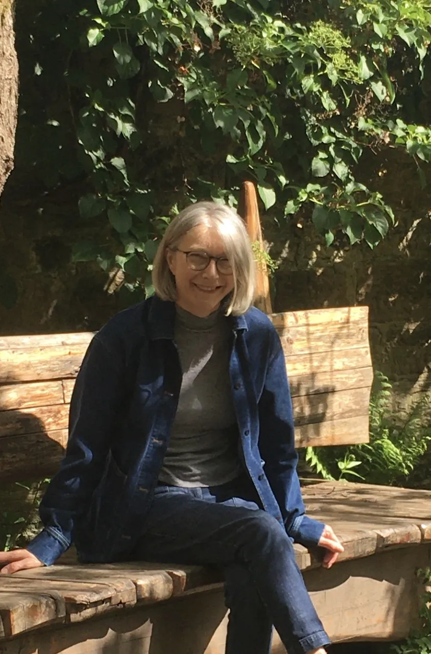 VIKING Volunteer Lena Armstrong sitting on a bench in a park