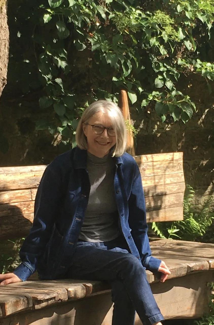 VIKING Volunteer Lena Armstrong sitting on a bench in a park